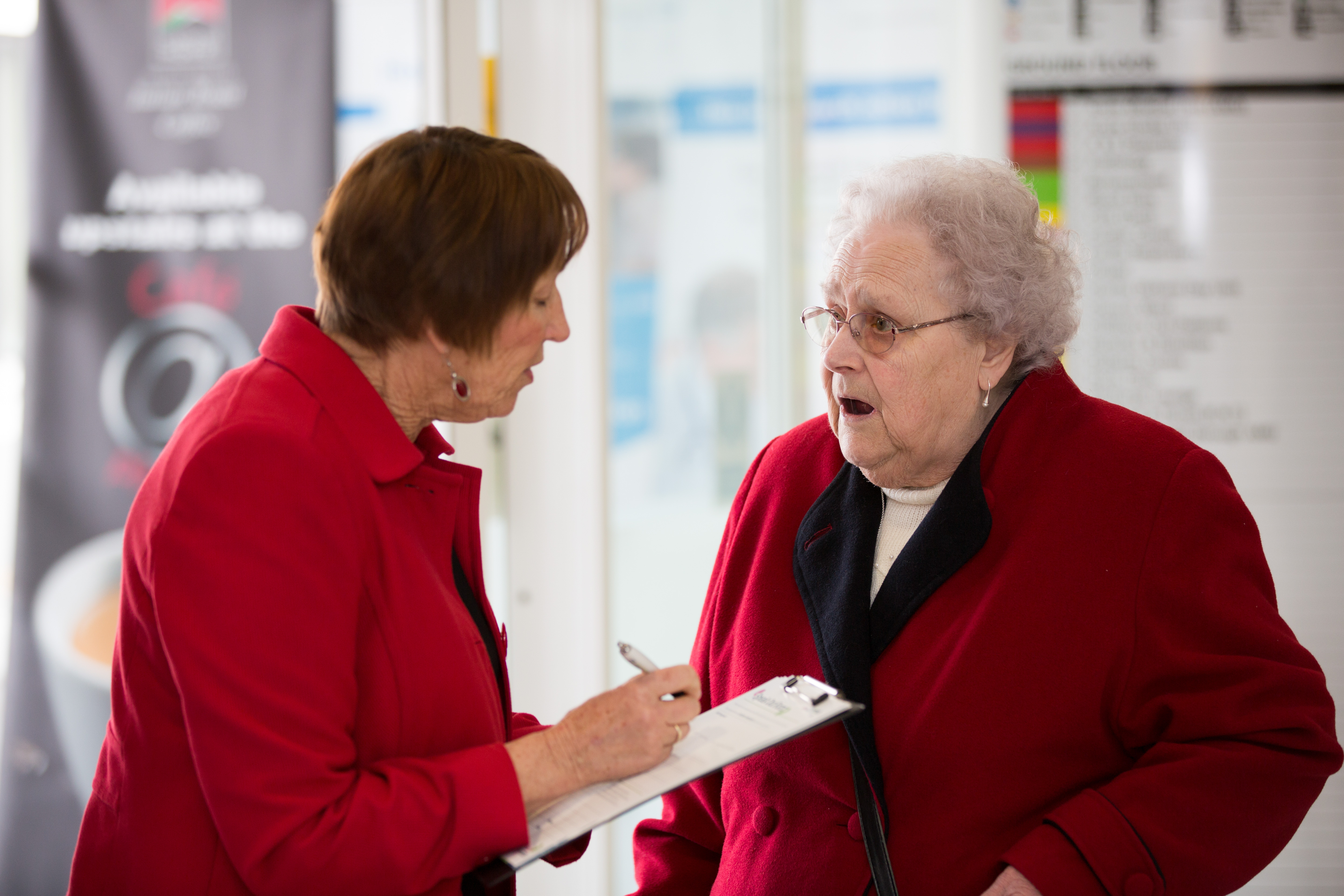 Pensioner answering a questionnaire